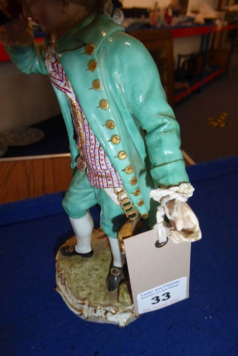 A 19th century Meissen figure model; in 18th century-style dress with a long green coat and - Image 4 of 10