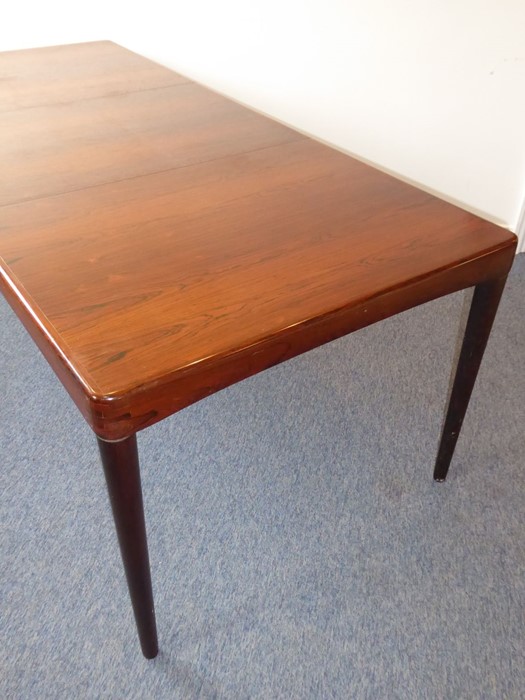 A 20th century extending rosewood dining table by 'Bramin' (Denmark); with central extension leaf - Image 3 of 6