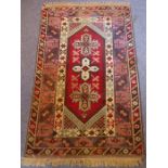 A Turkish Melas rug (approx. 184cm x 113cm)