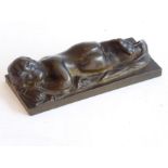 A 19th century continental bronze model of a naked infant asleep upon a robe; good patination and
