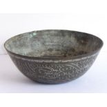 A 19th century circular Chinese brass bowl engraved with a bamboo border above a fen and dragon,
