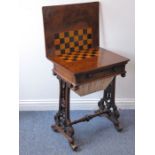 A mid-19th century figured walnut work table; the (un-affixed) hinged top opening to reveal a
