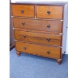 An Anglo-Indian two-part military-style hardwood and brass bound chest, the reeded edge top above