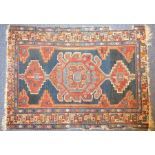A circa 1940s Hamadan rug (damage) (142cm x 102cm)