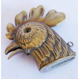 A novelty brass vesta case modelled as a rooster's head (probably early 20th century), with