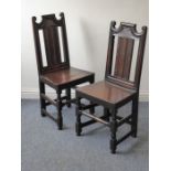 A pair of late 17th/early 18th century oak side chairs; each with shaped crest rail, vertical splat,