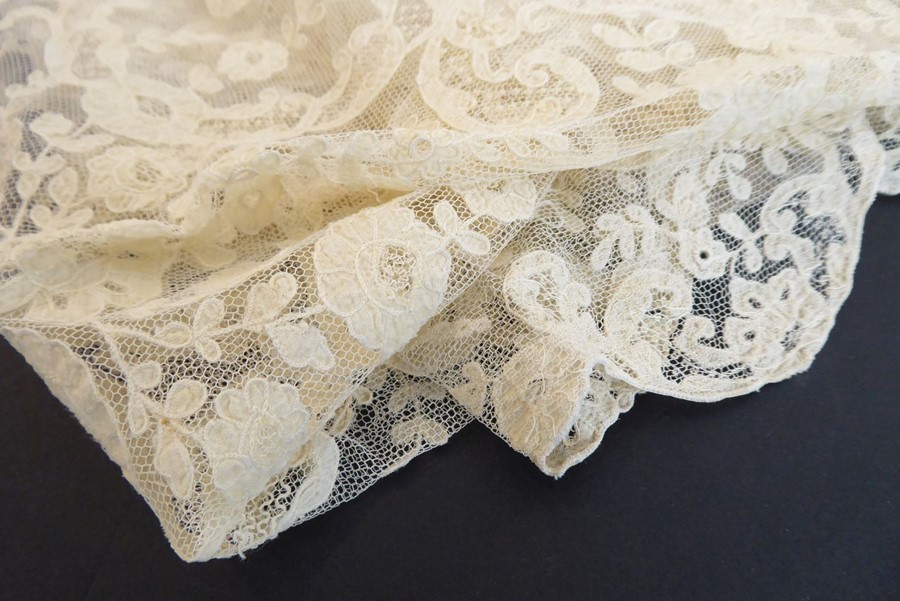 A circa 1890s cream-coloured wedding veil in Brussels lace with floral motifs. Provenance: Worn by - Image 2 of 2