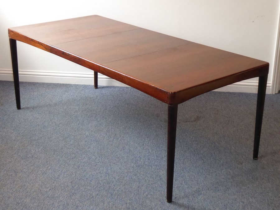 A 20th century extending rosewood dining table by 'Bramin' (Denmark); with central extension leaf - Image 2 of 6