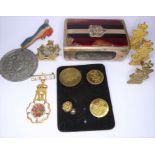 A mixed lot to include a 1920s silver Duke of Edinburgh's Regiment vesta case (the enamelled