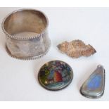 A small bijouterie group; to include a hallmarked silver napkin ring, an Edwardian silver 'Mother'