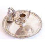 An unusual 19th century silver-plated chamber stick; the candle holder modelled as a lamp with large