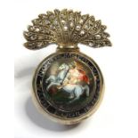 An enamel and diamond-set regimental brooch for the Royal Northumberland Fusiliers; the grenade with