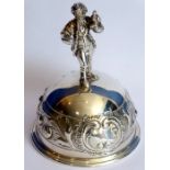 A late 19th century continental silver table bell, the handle modelled as a young boy in 18th