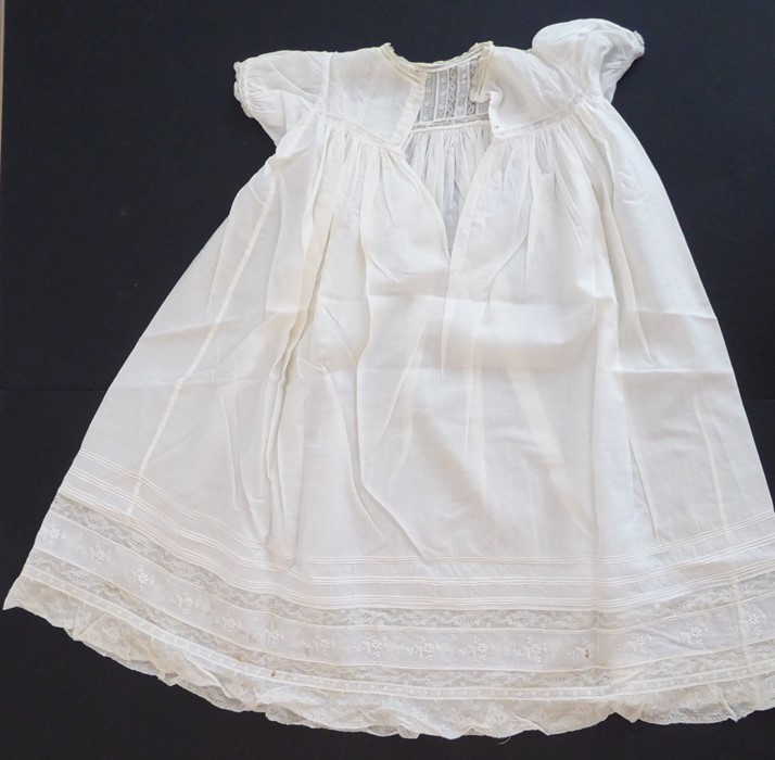 A 1930s Happy Days baby's cotton nightgown; ivory cotton lawn with white work details and applied - Image 4 of 4