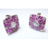 A pair of 18-carat ruby and diamond cluster earrings (The cost of UK postage via Royal Mail