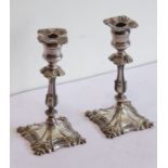 A pair of 19th century miniature silver-plated candlesticks/taper sticks by Elkington & Co.; in