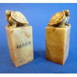 A pair of Chinese export soapstone 'Tortoise Seals', carved with English names 'Mary' and 'Robert'