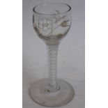 An opaque twist wine glass of Jacobite significance, the bowl engraved with a rose and bud Minor
