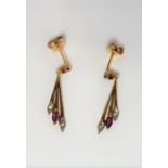 A pair of gold, ruby and diamond earrings (The cost of UK postage via Royal Mail Special Delivery