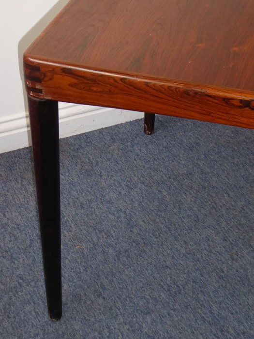 A 20th century extending rosewood dining table by 'Bramin' (Denmark); with central extension leaf - Image 4 of 6