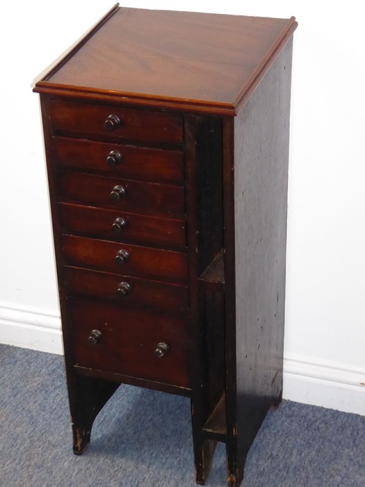 A 19th century mahogany printer's side cabinet; angular galleried top over drawers with