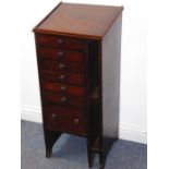 A 19th century mahogany printer's side cabinet; angular galleried top over drawers with