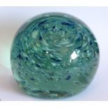 A 19th century green-glass dump decorated with swirling blue, cream and clear bubbles etc. (11cm
