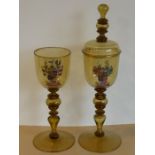 A pair of 19th century (in earlier style) oversized amber-coloured goblets (one with cover); each