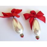 Vintage jewellery by Monty Don, circa 1980s; a pair of pearl and red-crystal clip-on earrings (as