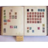 The Utile hinged leaf album (Stanley Gibbons Ltd, London) containing a wide variety of worldwide