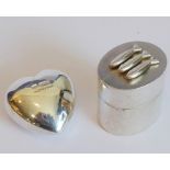 A heavy solid hallmarked silver heart by Mappin & Webb, London 1991, together with a similar sized