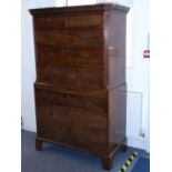 A late 18th century mahogany chest on chest; the key fret cornice above tow half-width and three