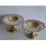 A pair of early 20th century hallmarked silver bon-bon dishes of pedestal form by Mappin & Webb,