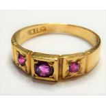 An early 18-carat gold ring set with three rubies (The cost of UK postage via Royal Mail Special