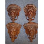 Of Rock and Roll interest, a set of four 'grotesque mask' wall brackets originally belonging to John