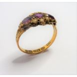 A mid-Victorian 15-carat yellow-gold pink gemstone and half pearl ring; the three oval mixed cut