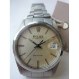 A steel-cased Rolex Oysterdate Precision wristwatch; the cream-coloured dial signed and with baton