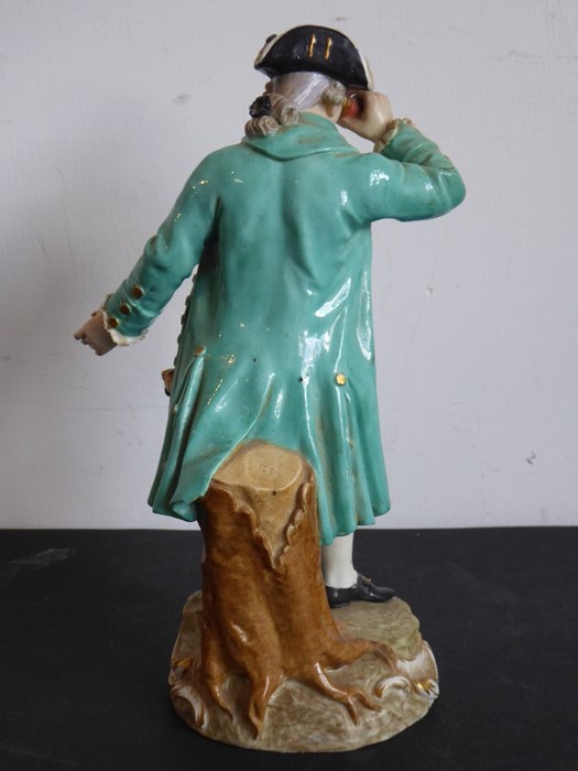 A 19th century Meissen figure model; in 18th century-style dress with a long green coat and - Image 6 of 10