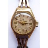 A ladies 9-carat yellow-gold cased dress wristwatch; the dial with fading damage etc., signed Smiths