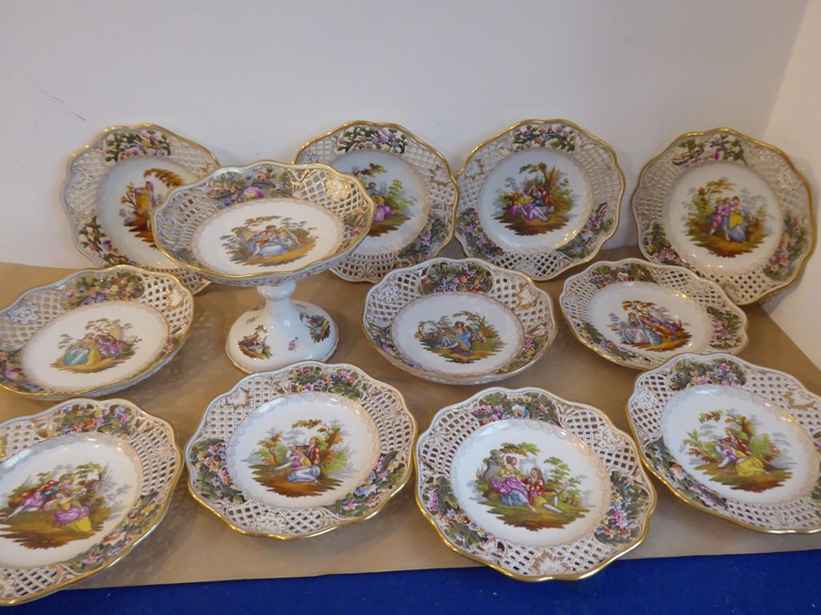 A good late 19th/early 20th century Dresden porcelain part dessert service comprising comport, two