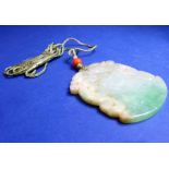 A jadeite axe-form double dragon pendant on silk cord with a red-coral bead bound with seed