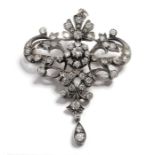 An early/mid-19th century diamond-set brooch/pendant; of openwork scrolling design, with a central