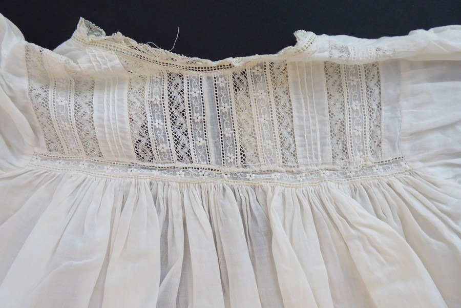 A 1930s Happy Days baby's cotton nightgown; ivory cotton lawn with white work details and applied - Image 2 of 4