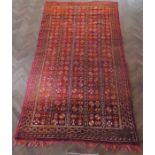 A good 1930-1940 hand-knotted Berber tribal rug (Morocco, Atlas Mountains); red ground with