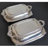 A pair of early 20th century fine silver-plated two-handled entrée dishes with the handle