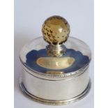 An Edwardian circular hallmarked silver box with hinged cover, the hand-cut finial (possible a smoky