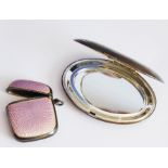 A late 19th/early 20th century silver (marked 925) and pink guilloche enamel vesta case together