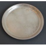 A hallmarked silver circular salver having raised gadrooned border, assayed Birmingham 1936 (24.