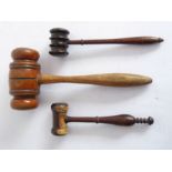 Three turned wood auctioneer's gavels (the largest 25cm in length)