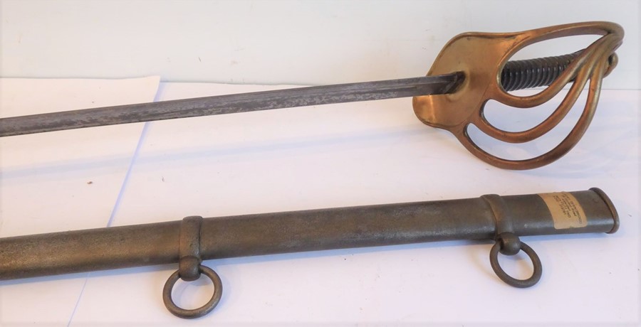 A French Model 1822  trooper's sword with all-iron scabbard;  the 38" blade in good condition,